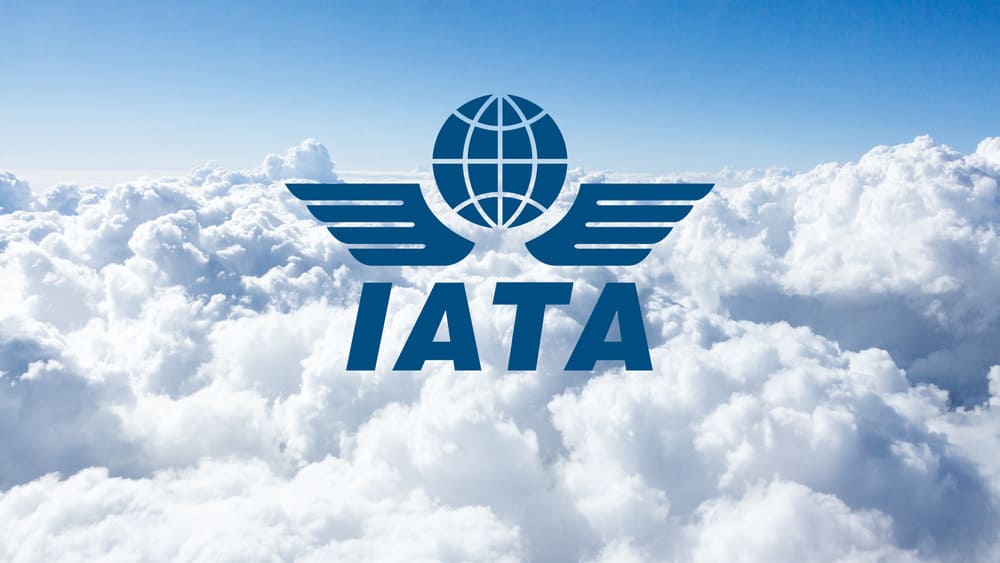 Международный код IATA на фоне облаков